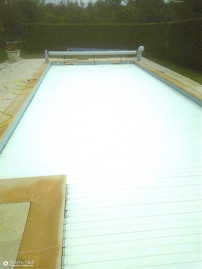 pose-de-volet-de-piscine-hors-sol